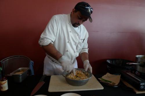 Don Ho's Robert Denis mixing his rice.